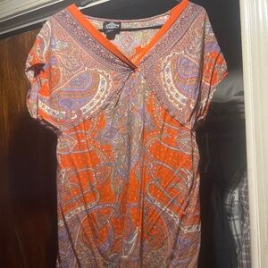 Orange and paisley purple, green, and yellow short sleeve top